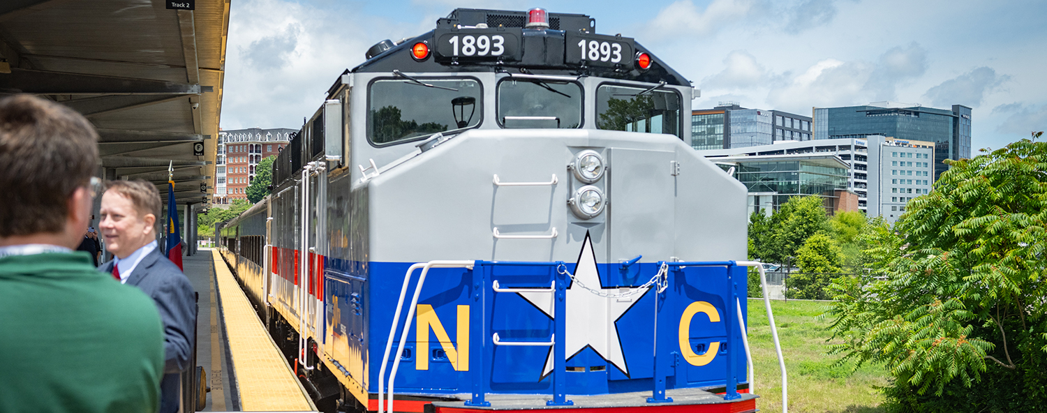An NC By Train engine pulls into Raleigh Union Station. 